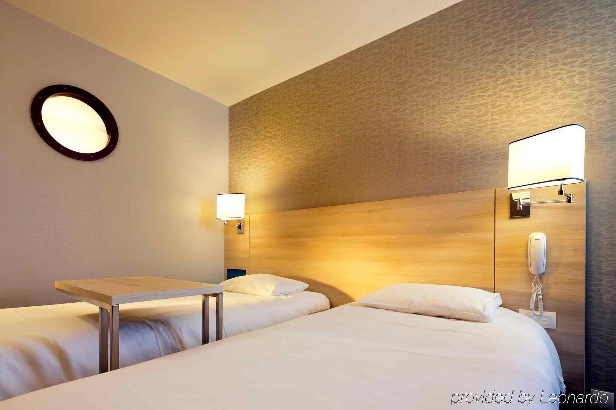 Ibis Styles Ouistreham Hotell Rom bilde